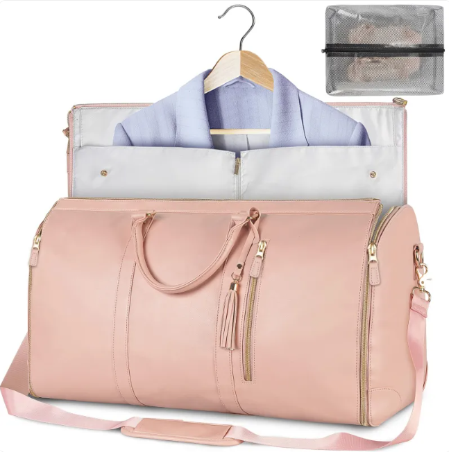 Large Capacity Waterproof Travel Duffel Bag in pink color with a spacious interior and hanging garment compartment.
