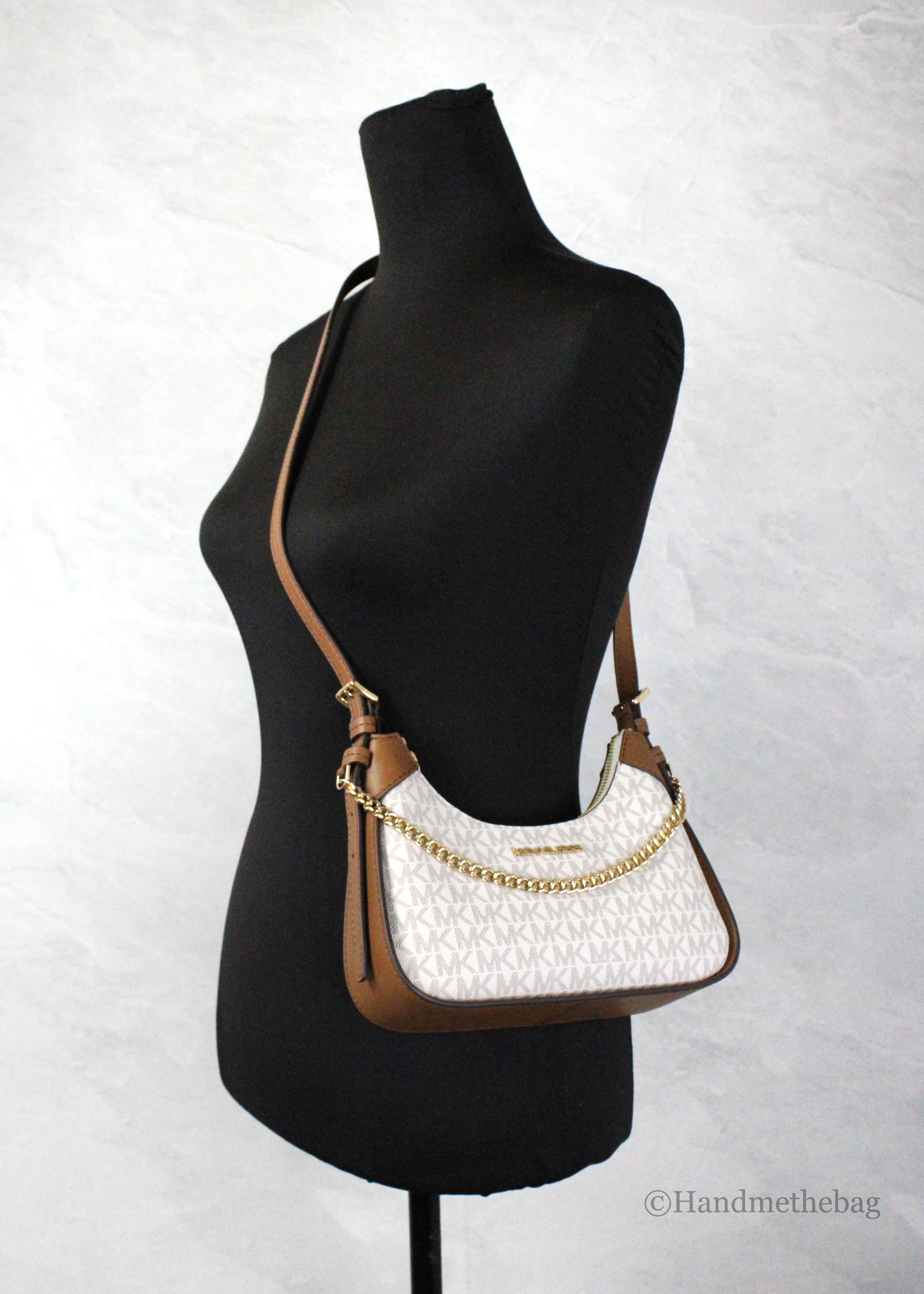 Michael Kors Wilma Small Vanilla PVC Chain Crossbody Bag featuring a chic design with signature PVC material and gold chain.