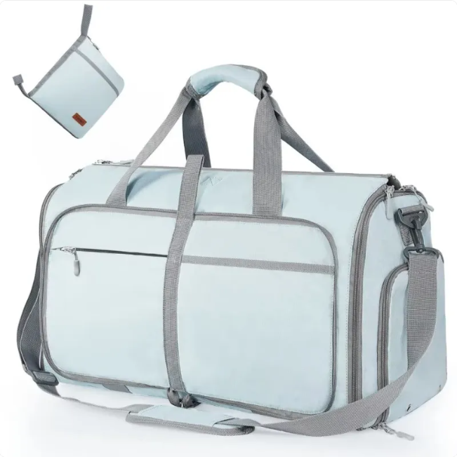Large Capacity Waterproof Travel Duffel Bag in light blue with adjustable strap and exterior pockets.